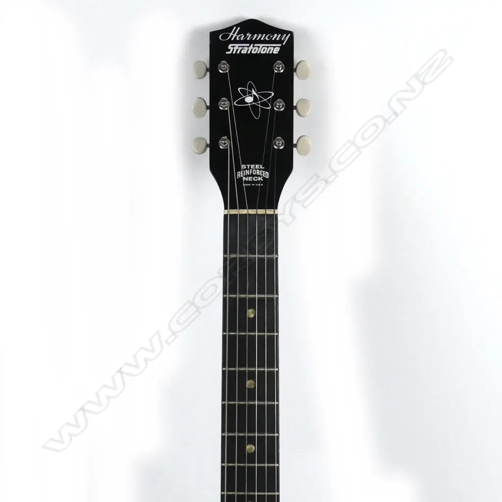 A Harmony Stratotone electric guitar Image 1++
