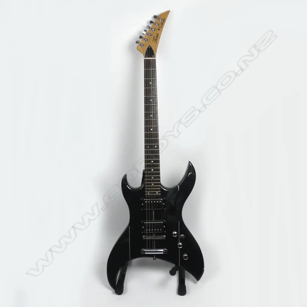 The next five lots are from musician Bill Ward; All three electric guitars were built under the brand name 'FOMI' owned by Bill Ward; ex Four Fours; Human Instinct and leader of the Bonneville Band. The Human Instinct were one of the first NZ bands to make a name in the UK moving in 1966 and playing with many well-known contemporary bands such as The Rolling Stones; Spencer Davis Group; 10cc and Status Quo Image 1++