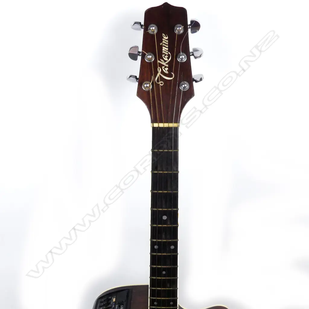 A Takamine electric-acoustic guitar Image 1++