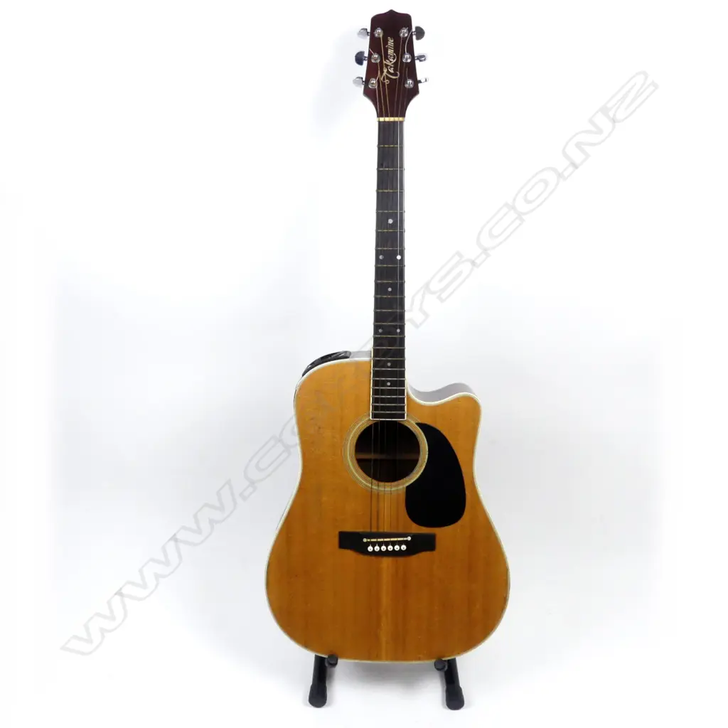 A Takamine electric-acoustic guitar Image 1++