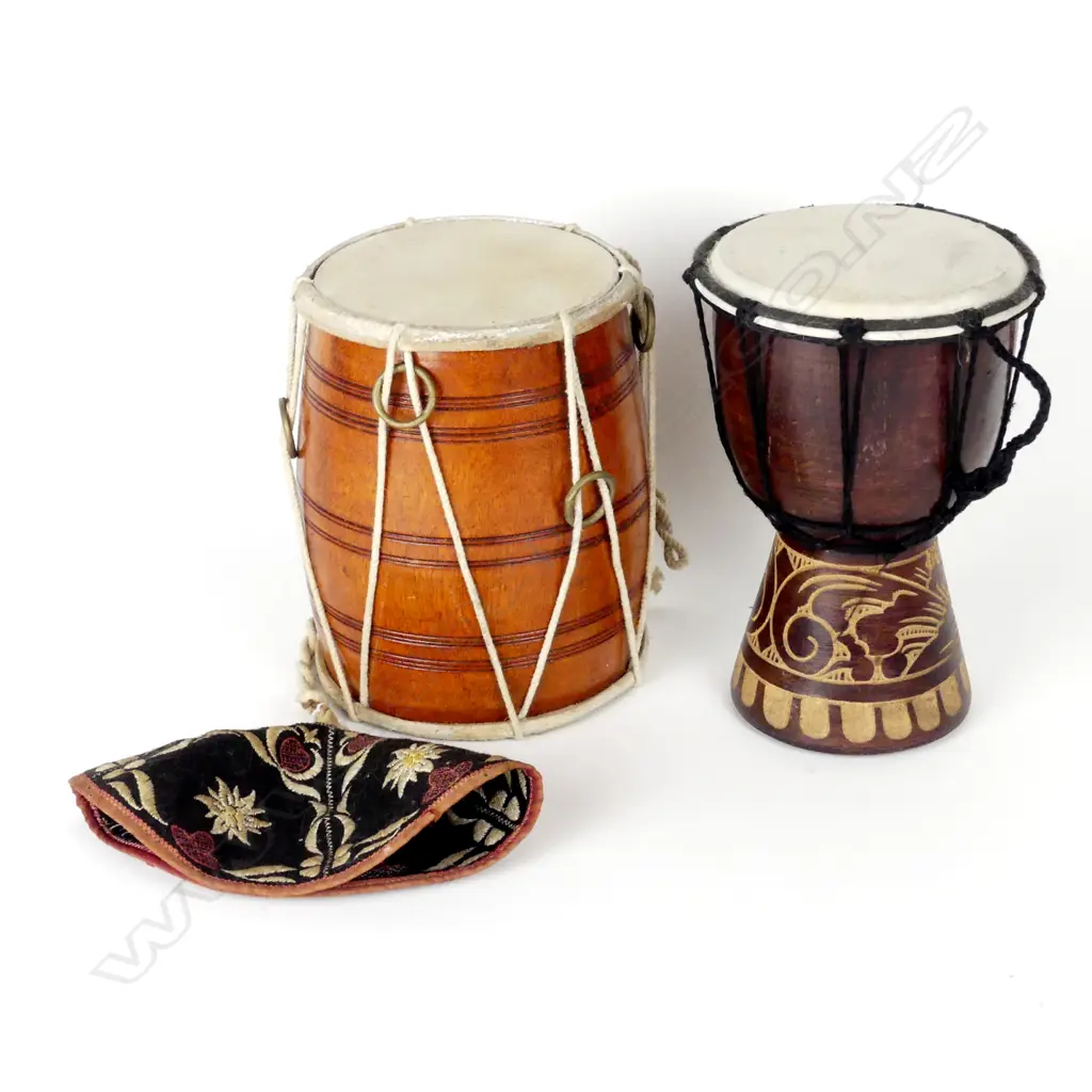 Two small bongo drums and an embroidered felt cap Image 1++