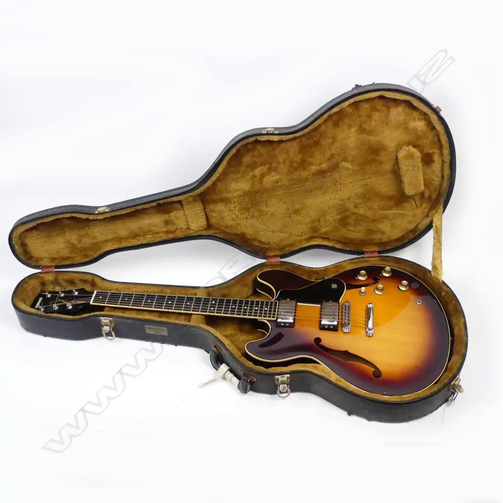 A Yamaha Super Axe electric guitar Image 1++
