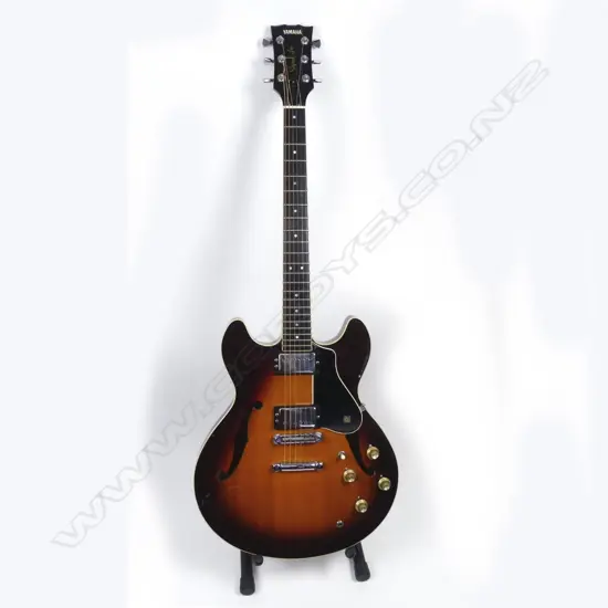 A Yamaha Super Axe electric guitar