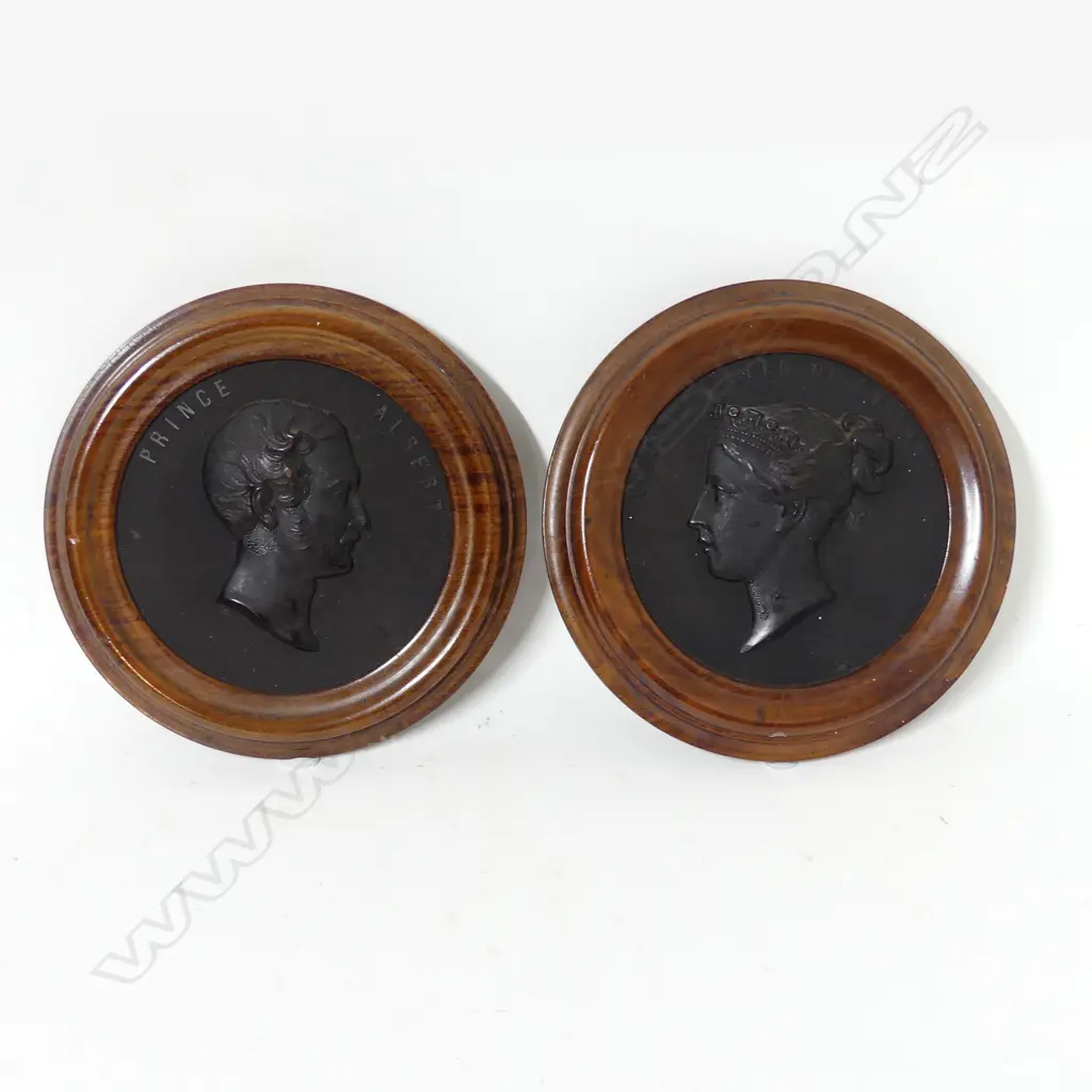 A pair of bois durci framed plaques Image 1++