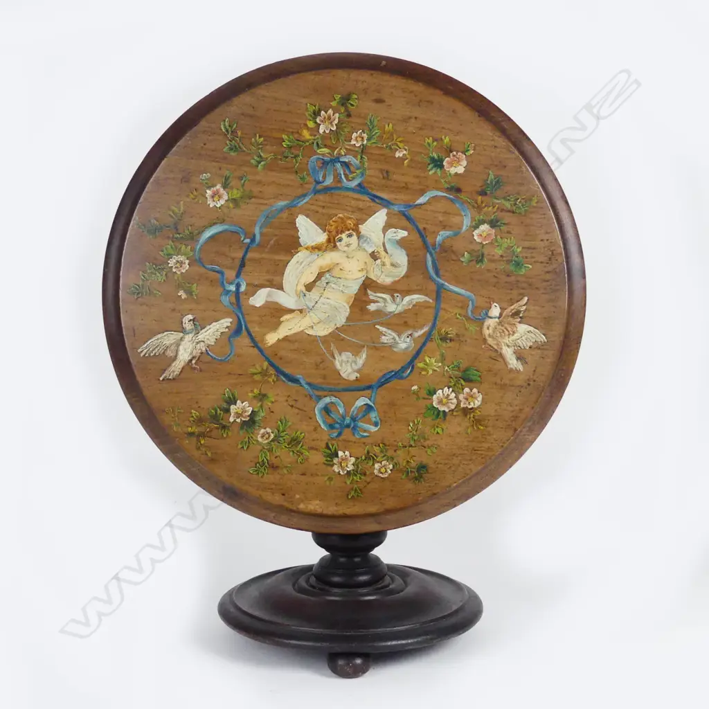 A Victorian miniature tilt top table Image 1++