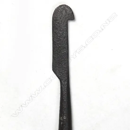 A weighty iron blubber knife