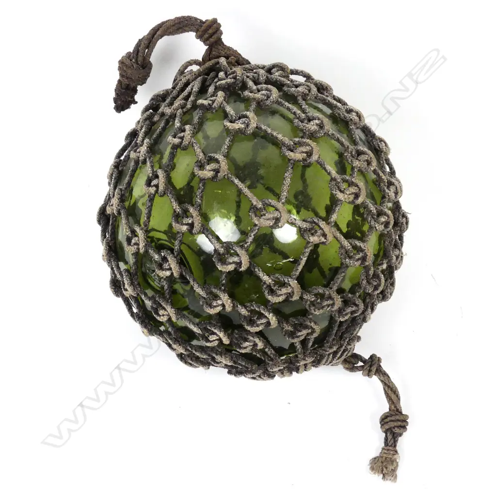 A large green glass fishing buoy Image 1++