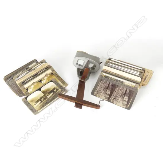 A stereoscope and quantity of cards