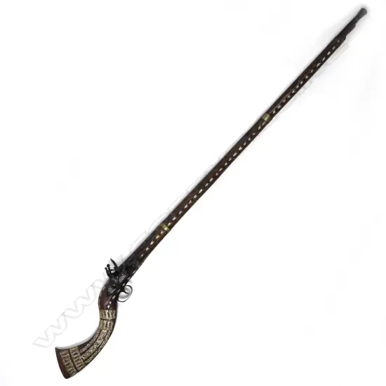 An antique Arab flintlock muzzle loading musket