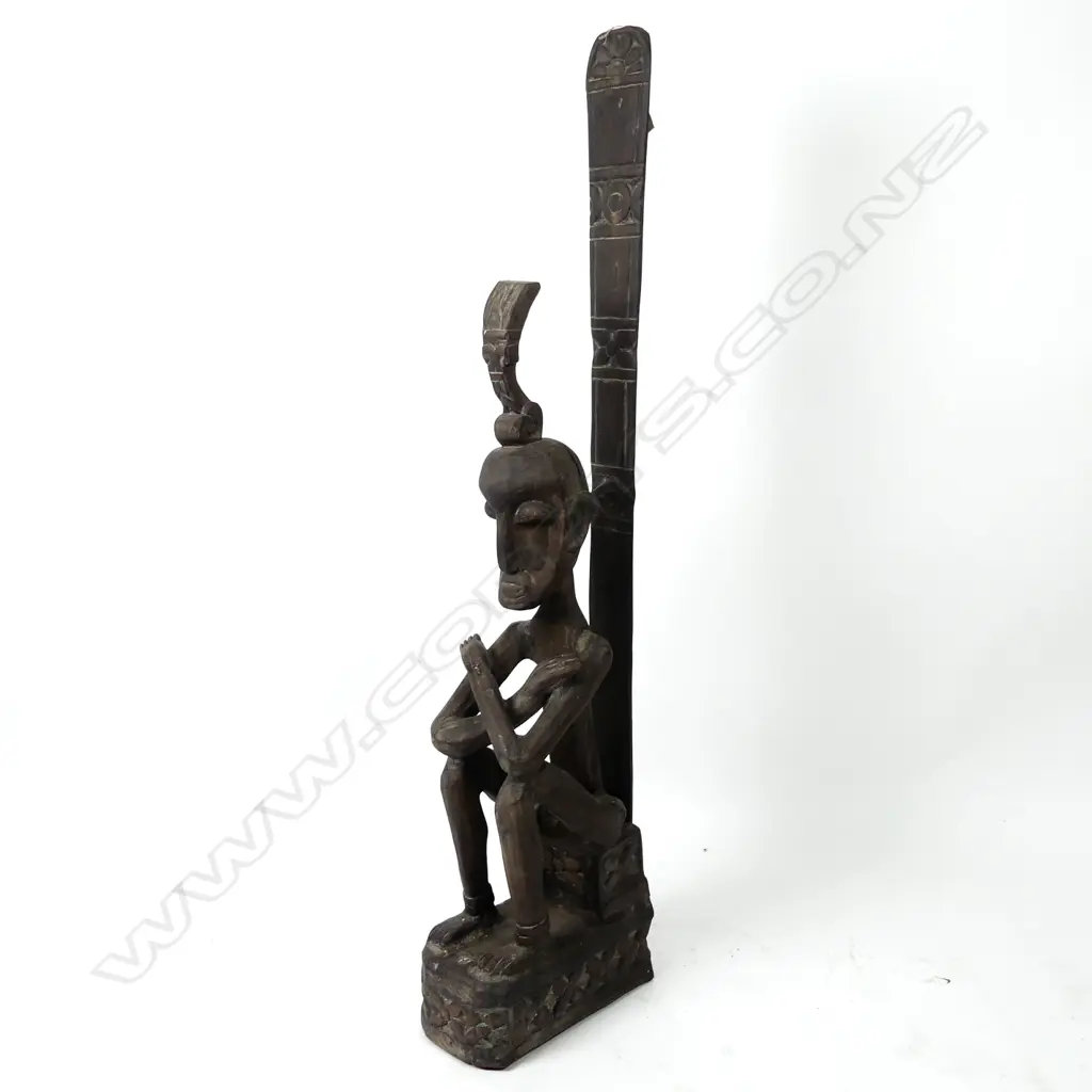 An Indonesian large craved wood seated figure Image 1++
