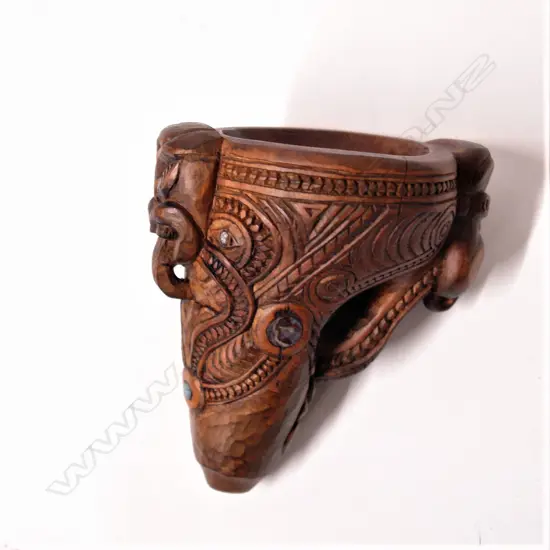 A late 20thC Maori carved korere (feeding funnel)