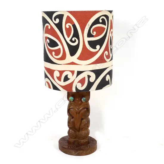 A Maori folk art carved tiki based table lamp