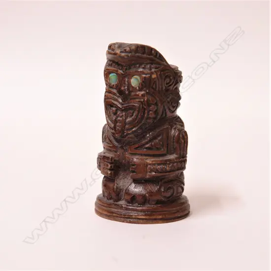 An early 20thC Maori carved figural vesta holder