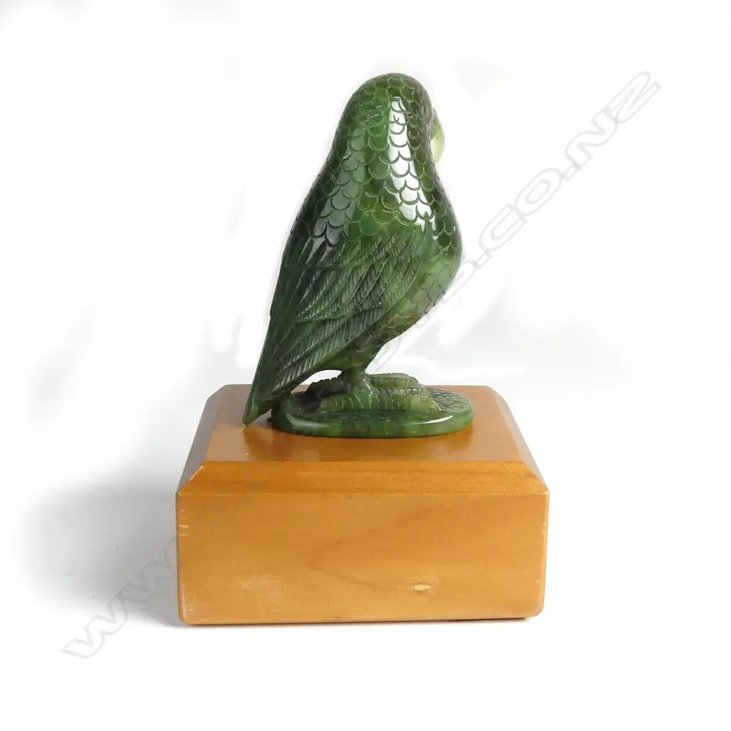 A carved greenstone kea Image 1++