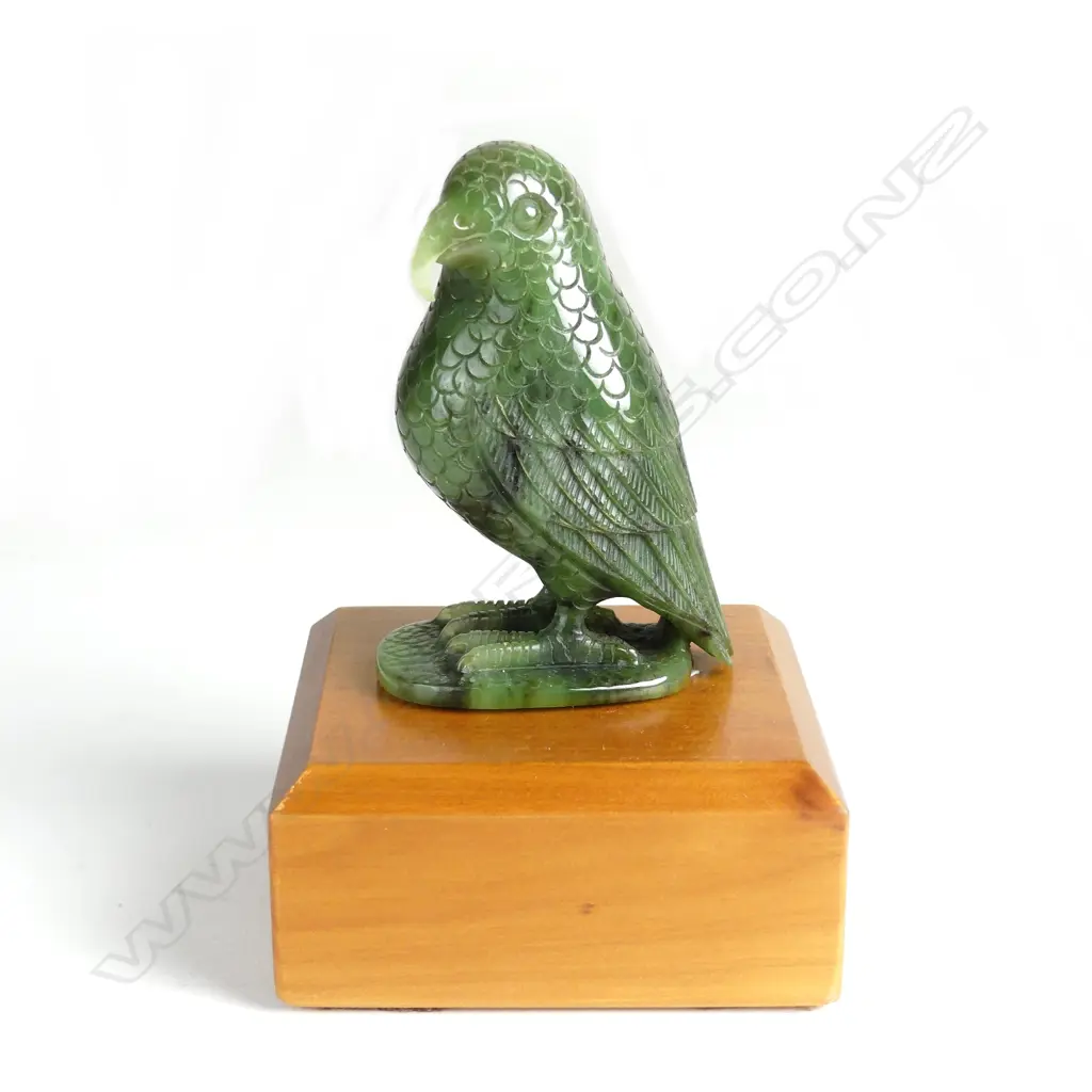 A carved greenstone kea Image 1++