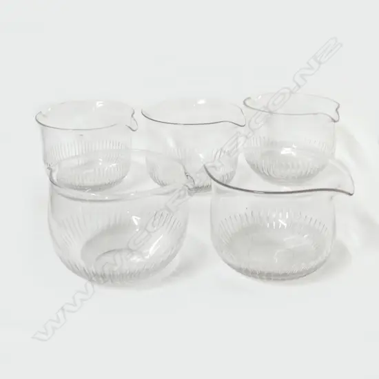 Five Georgian glass twin spouted rinsing bowls