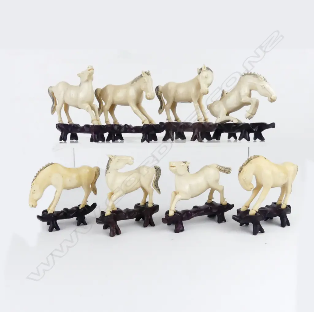 A set of eight Chinese carved ivory 'Horses of Happiness' Image 1++