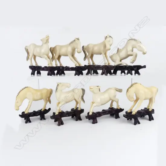 A set of eight Chinese carved ivory 'Horses of Happiness'
