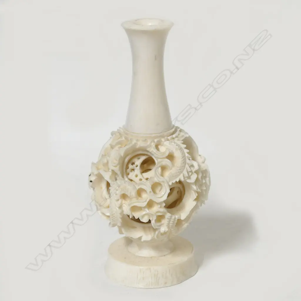 A vintage Chinese carved ivory puzzle ball vase Image 1++