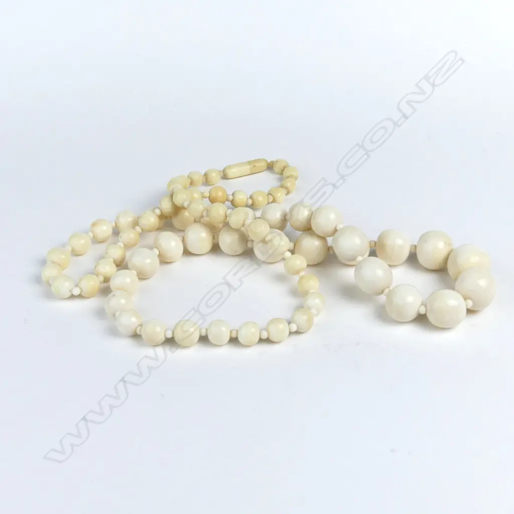 A vintage long carved ivory bead necklace Image 1++