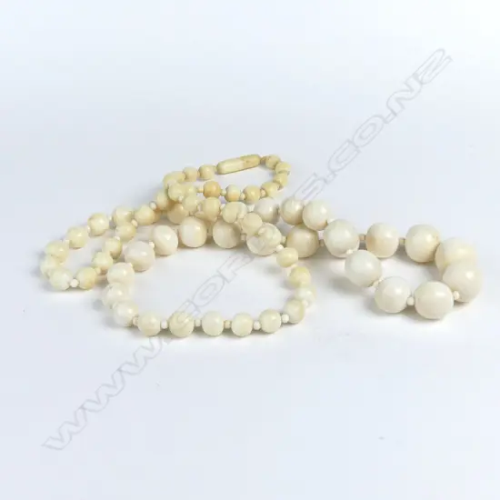 A vintage long carved ivory bead necklace