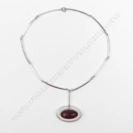 A stylish vintage Danish silver and amber necklace