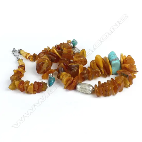 A Baltic amber turquoise and silver bead necklace