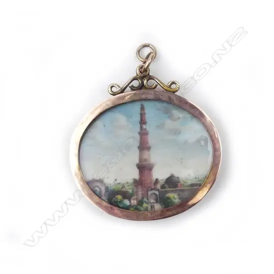 A 9ct rose gold and ivory pendant