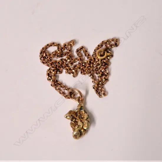 A gold nugget pendant