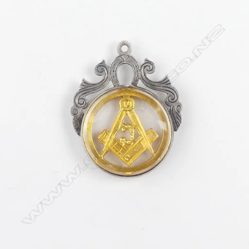 A silver and gold Masonic pendant Image 1++