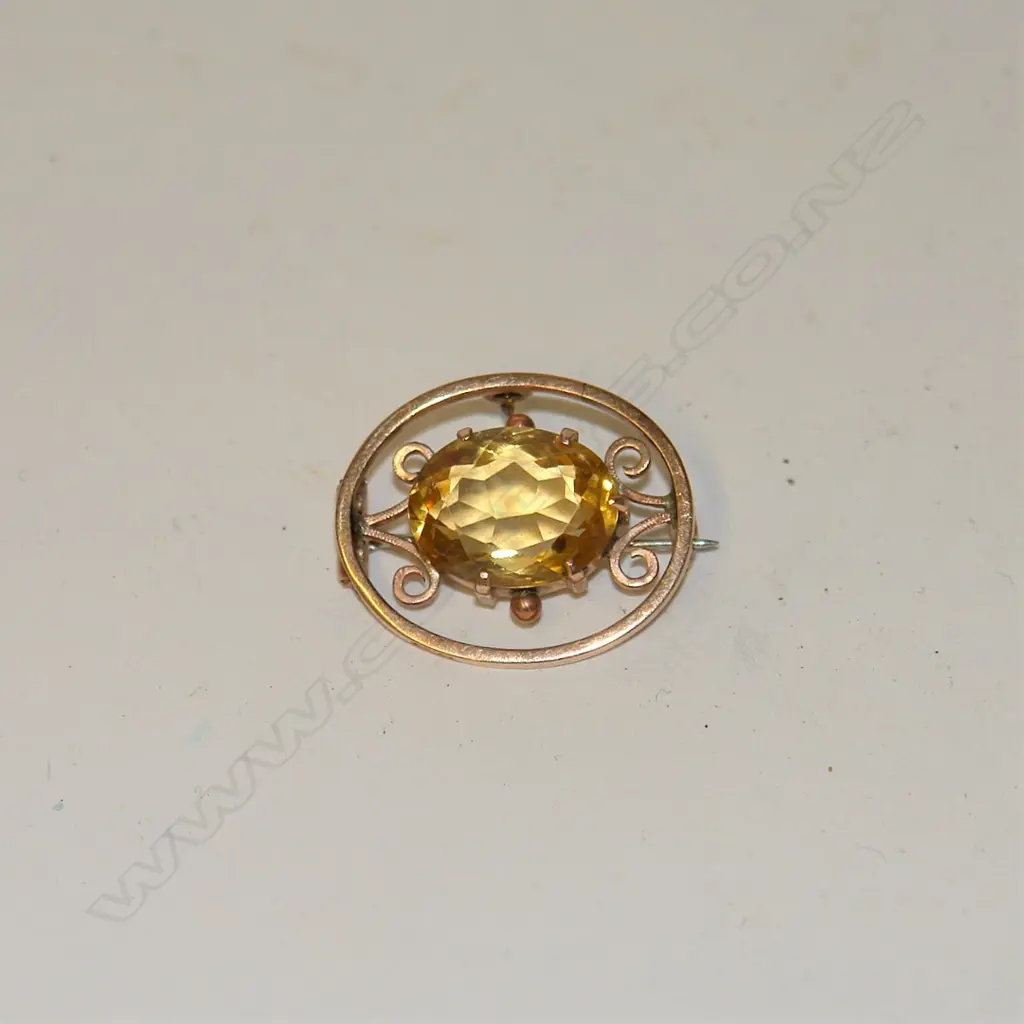 An Edwardian 9ct. rose gold and citrine brooch Image 1++
