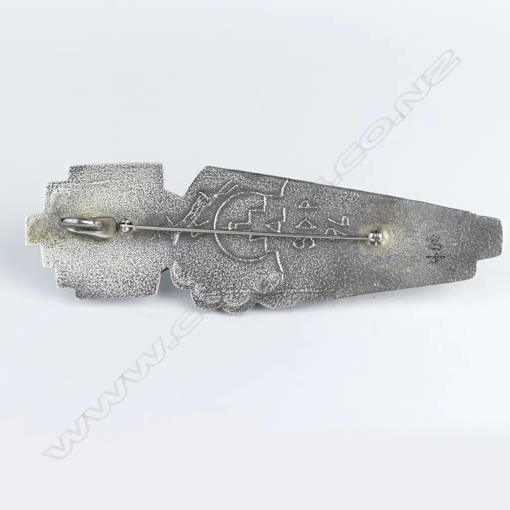 A contemporary silver and turquoise large brooch Image 1++