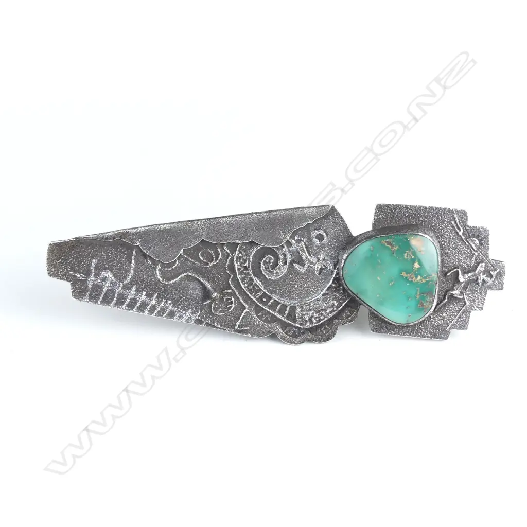A contemporary silver and turquoise large brooch Image 1++