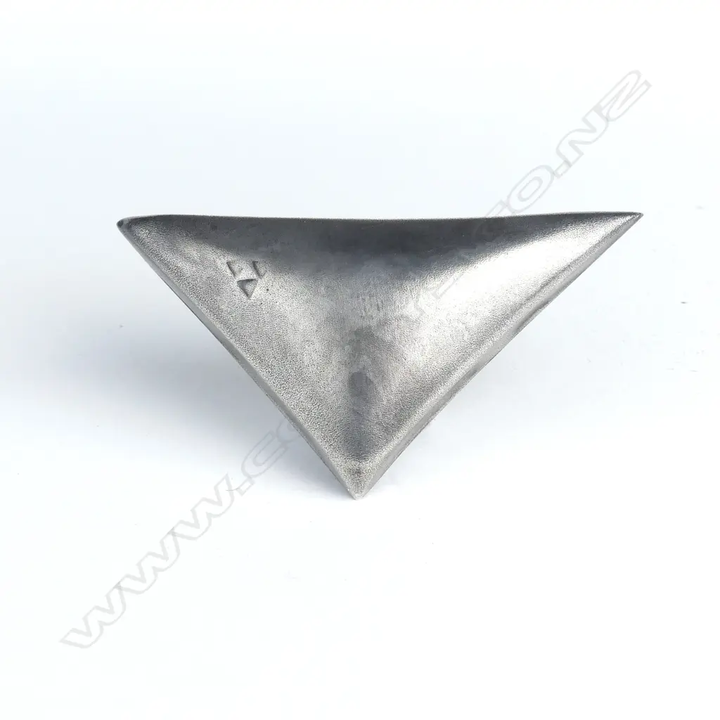 A modernist triangular puff form brooch Image 1++