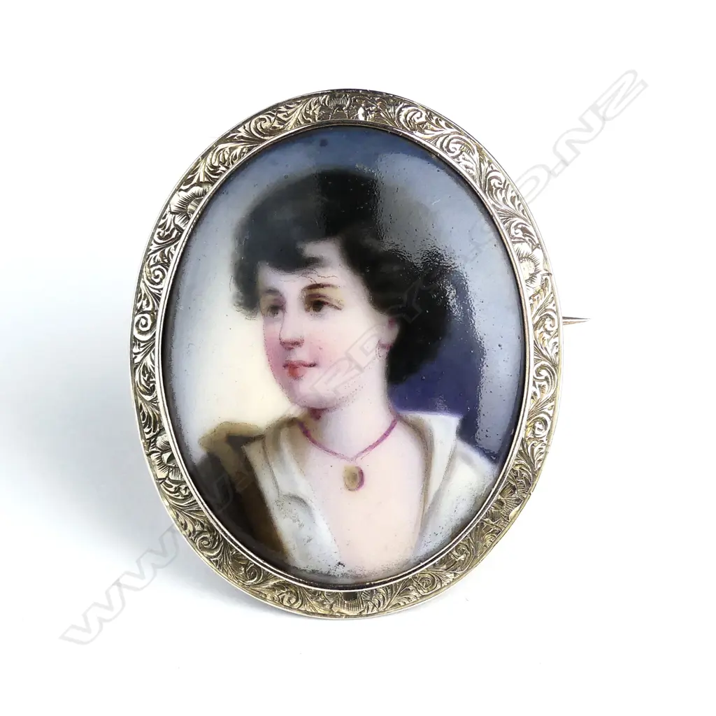 A c.1900 European hand painted porcelain portrait brooch Image 1++