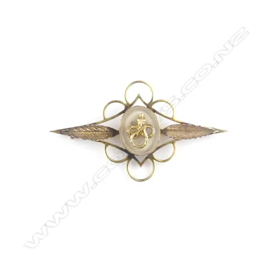 An unusual 9ct gold brooch