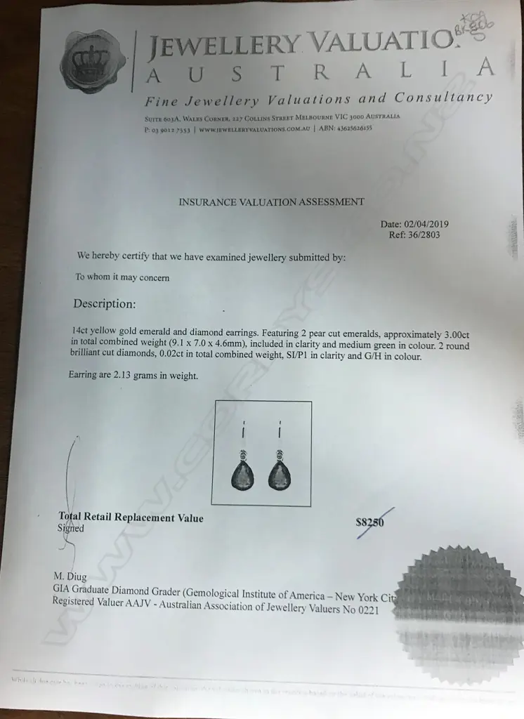 A pair of 14ct gold emerald and diamond earrings Image 1++