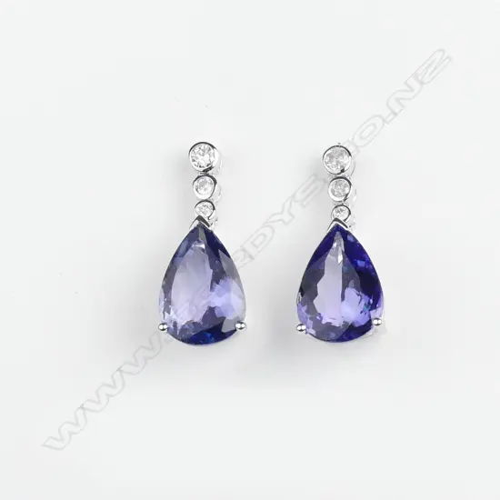 A pair of 14ct white gold tanzanite and diamond drop earrings