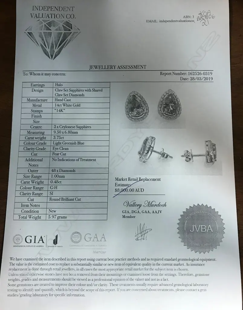 A pair of 14ct white gold sapphire and diamond earrings Image 1++