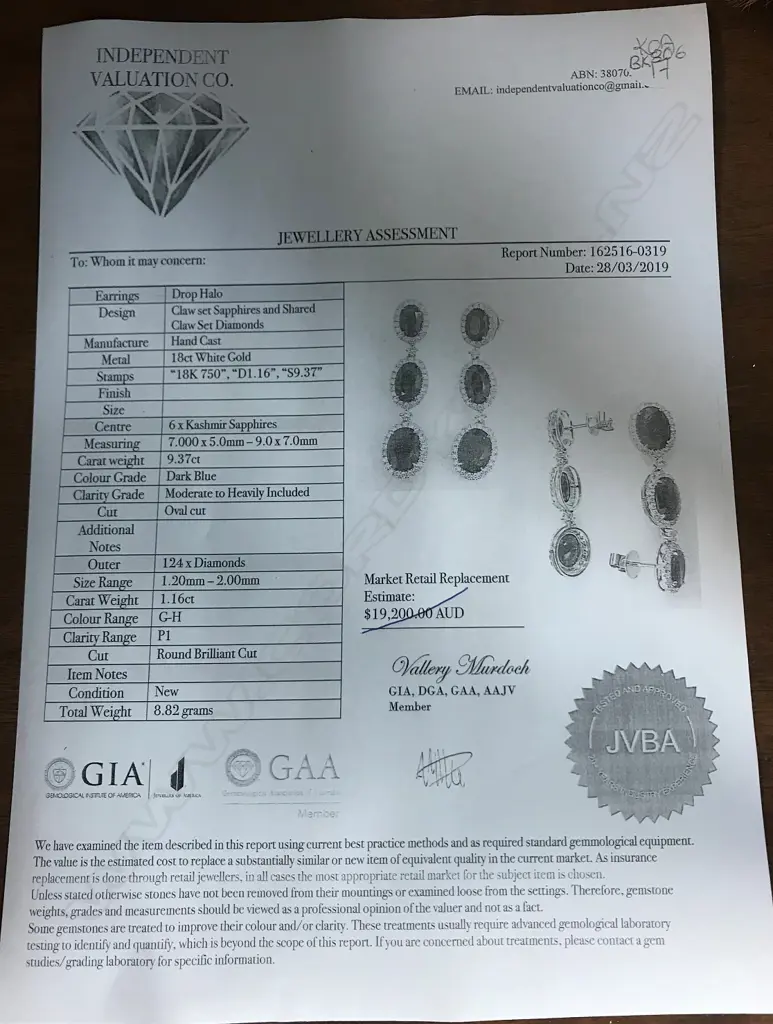 A pair of 18ct white gold sapphire and diamond earrings Image 1++