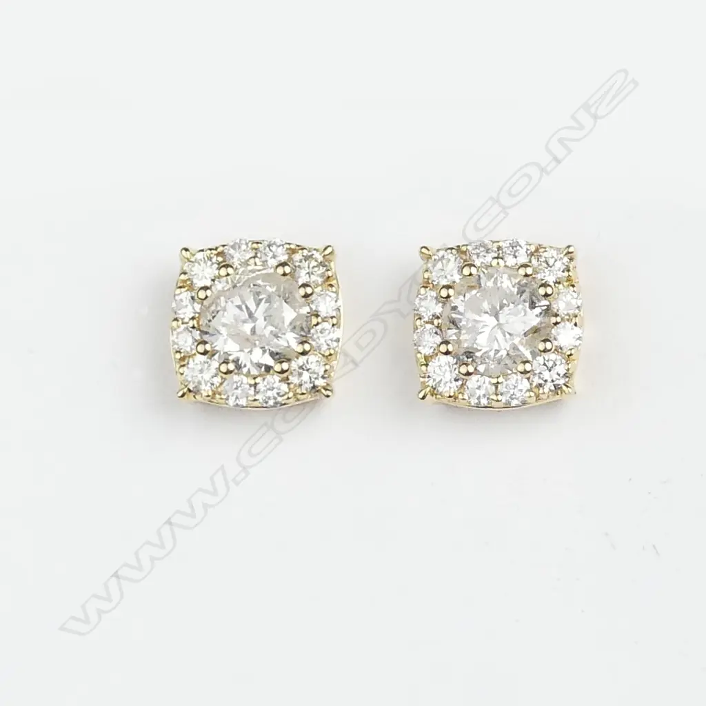 A pair of 18ct gold diamond cluster earrings Image 1++