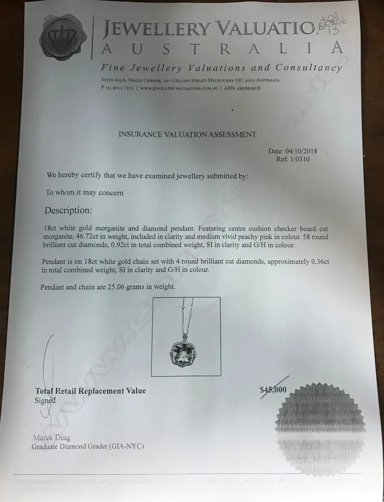 An 18ct white gold morganite and diamond pendant Image 1++