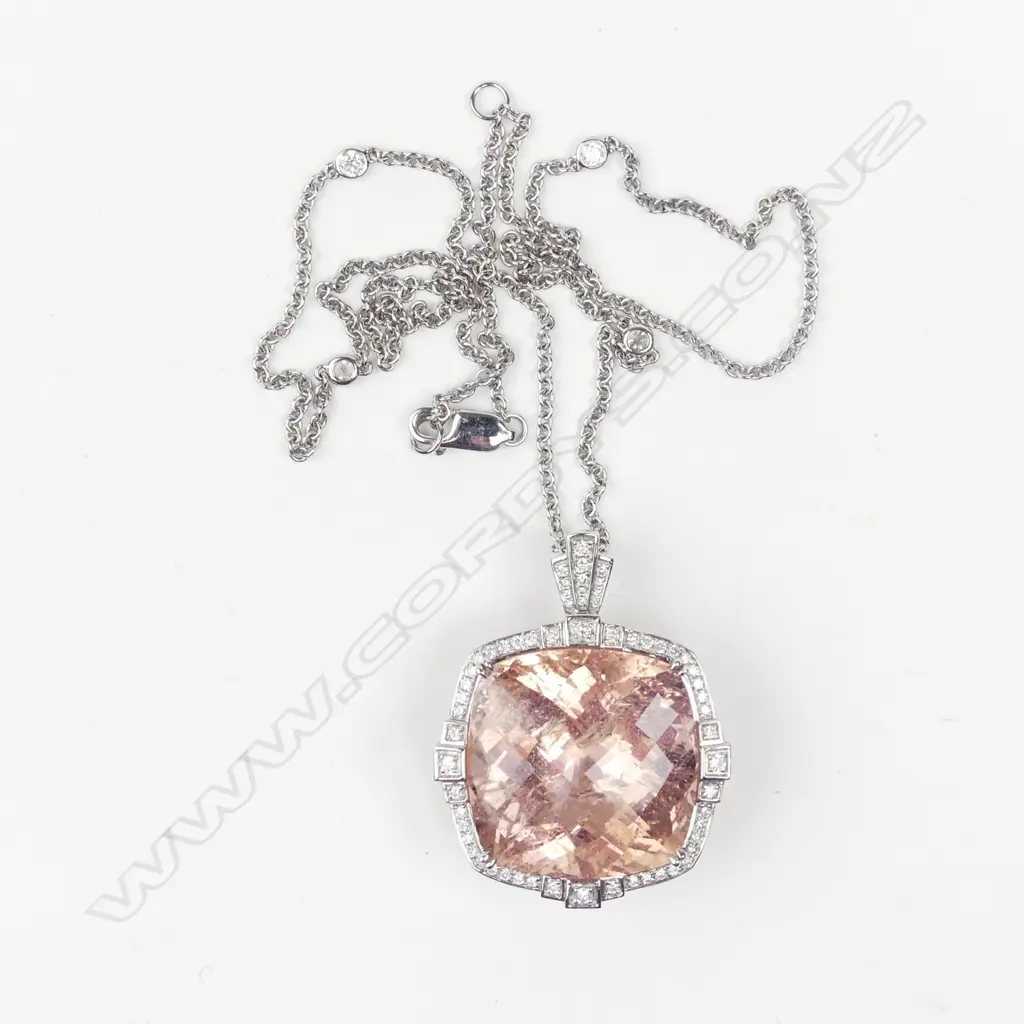 An 18ct white gold morganite and diamond pendant Image 1++