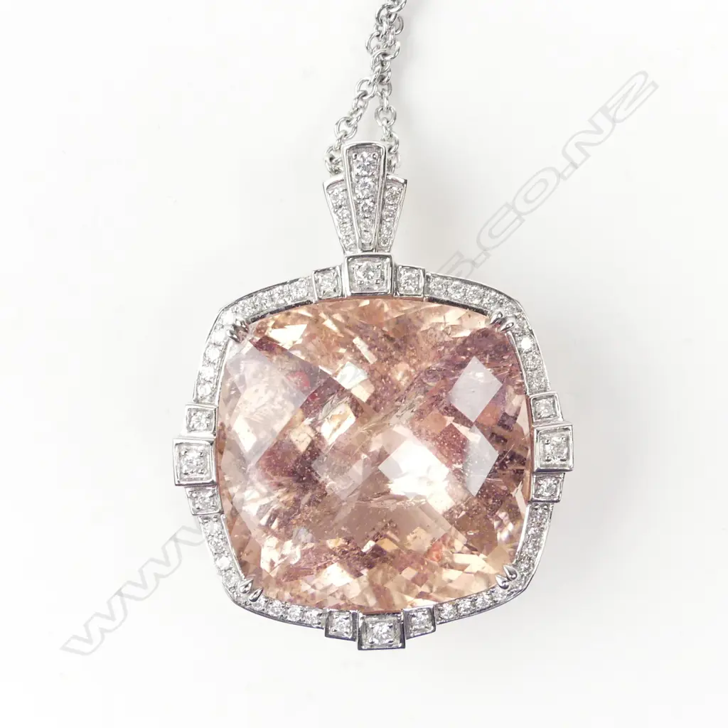 An 18ct white gold morganite and diamond pendant Image 1++