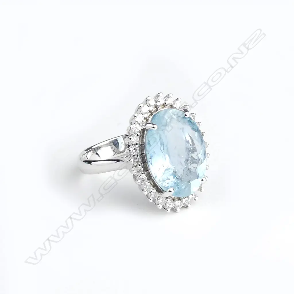 A 14ct white gold aquamarine and diamond ring Image 1++