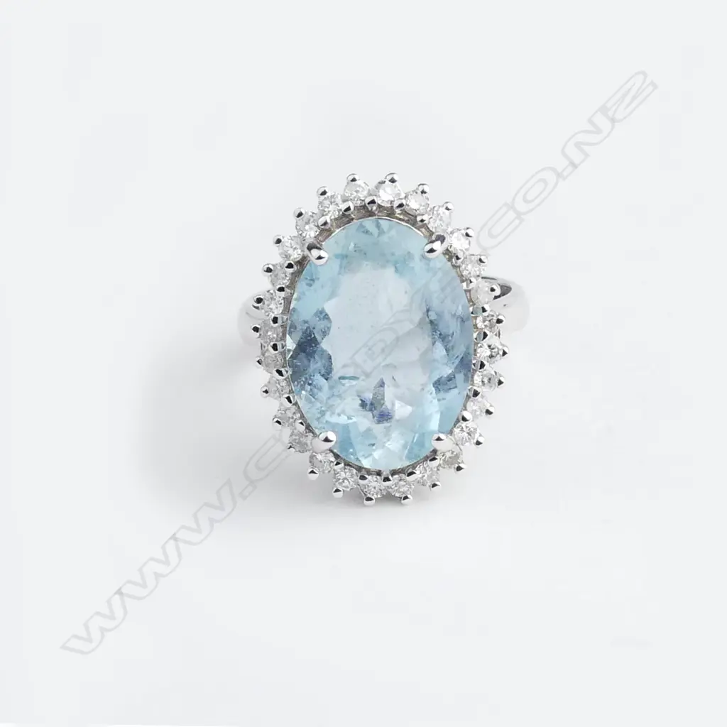 A 14ct white gold aquamarine and diamond ring Image 1++