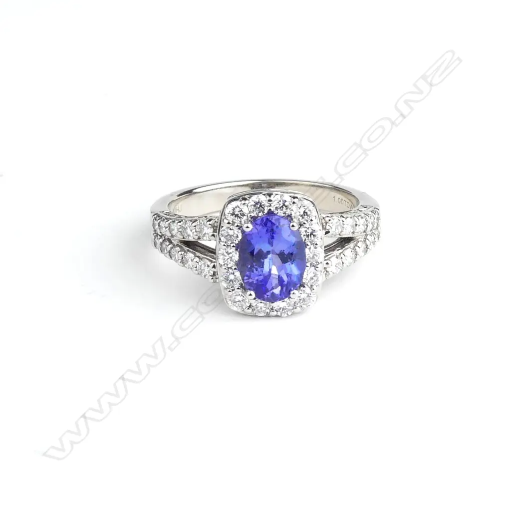 A 14ct white gold tanzanite and diamond ring Image 1++