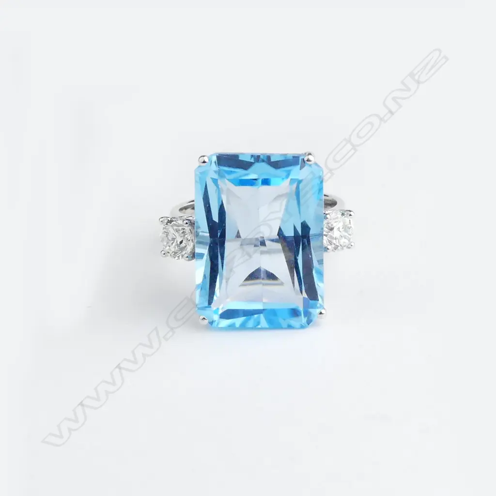 A 14ct white gold blue topaz and diamond ring Image 1++