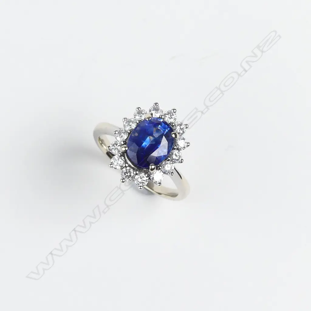 An 18ct white gold sapphire and diamond ring Image 1++