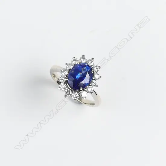 An 18ct white gold sapphire and diamond ring